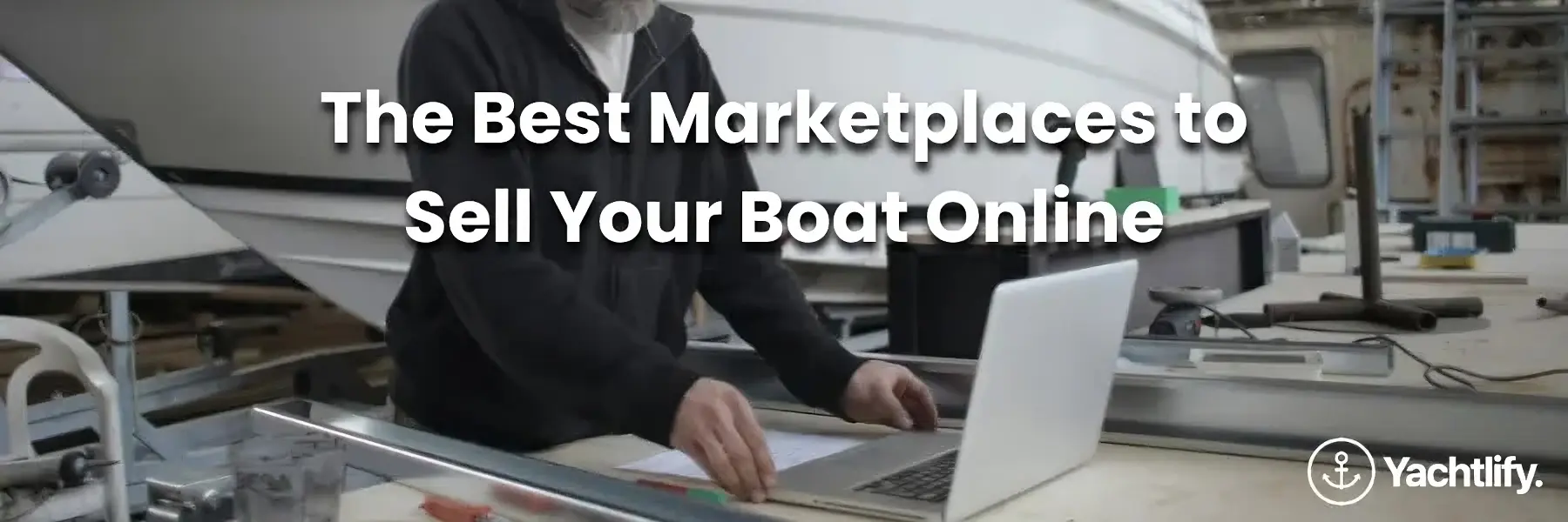 A man typing on his laptop in a shipyard, with the text "Best Marketplaces to Sell Your Boat Online" overlayed